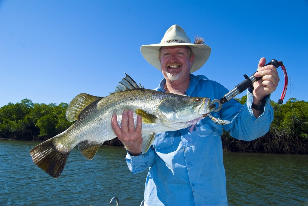 Graham Brake with a quality drain-caught barra.  Graham was using a iZUMi Shad Alive which swims slowly and naturally with a simple slow wind.  Cast into and worked out of drains, it is lethal! - Drains V Snags © Lee Brake